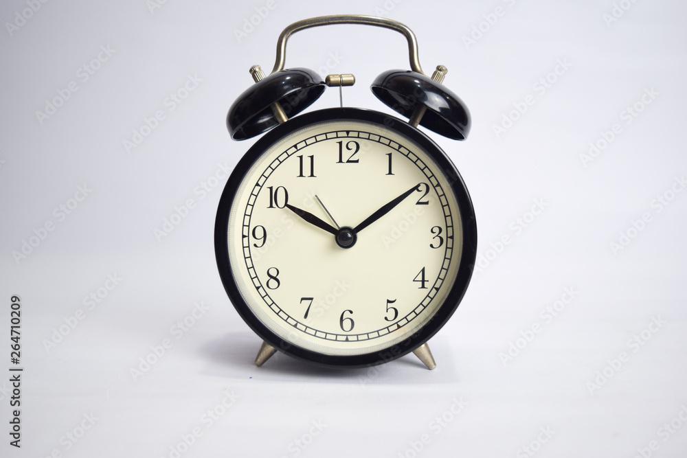 Clock ticking to 10 o'clock isolated on white background Clock ticking to 10 o'clock isolated on white background