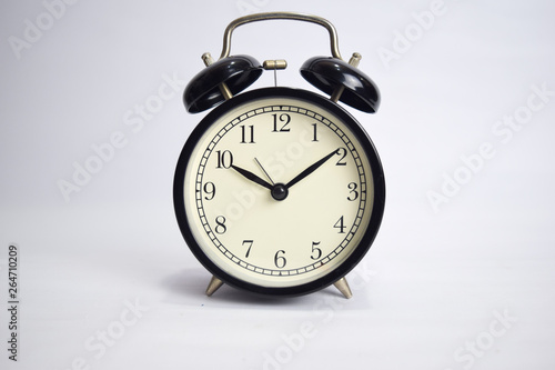 Clock ticking to 10 o'clock isolated on white background