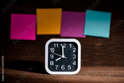 alarm clock with paper note background