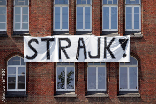 "Strajk" - a banner reading "strike" in Polish