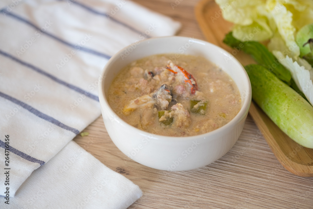 Simmer soft crab boiled in coconut milk with fresh vegetables Simmer soft crab boiled in coconut milk with fresh vegetables