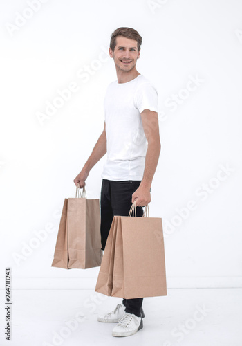 Guy satisfied carries bag