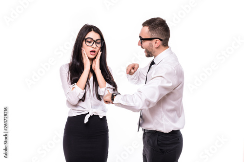 Portrait of displeased angry quarrel business colleagues couple showing watch of miss deadline isolated over white background .