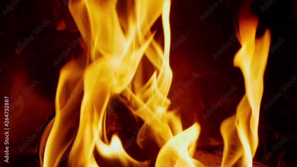 Burning Log Fire Flames in Fireplace Close-up Slow Motion Burning Log Fire Flames in Fireplace Close-up Slow Motion