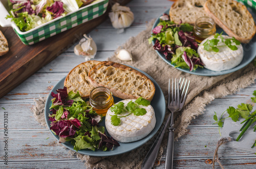 Grilled camembert cheese with honey