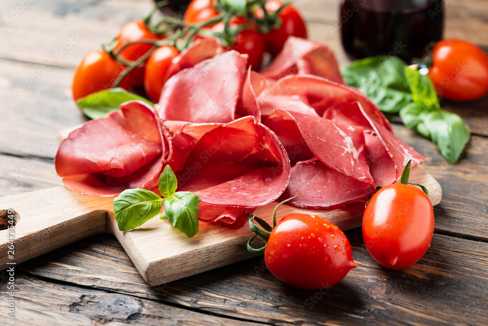 Italian antipasto with bresaola and red wine Italian antipasto with bresaola and red wine