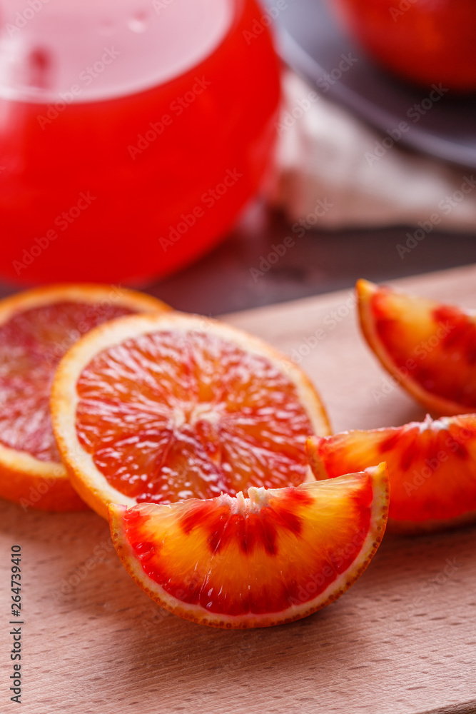 blood orange and juice on a dark background blood orange and juice on a dark background
