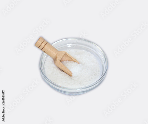 salt on a wooden spoon