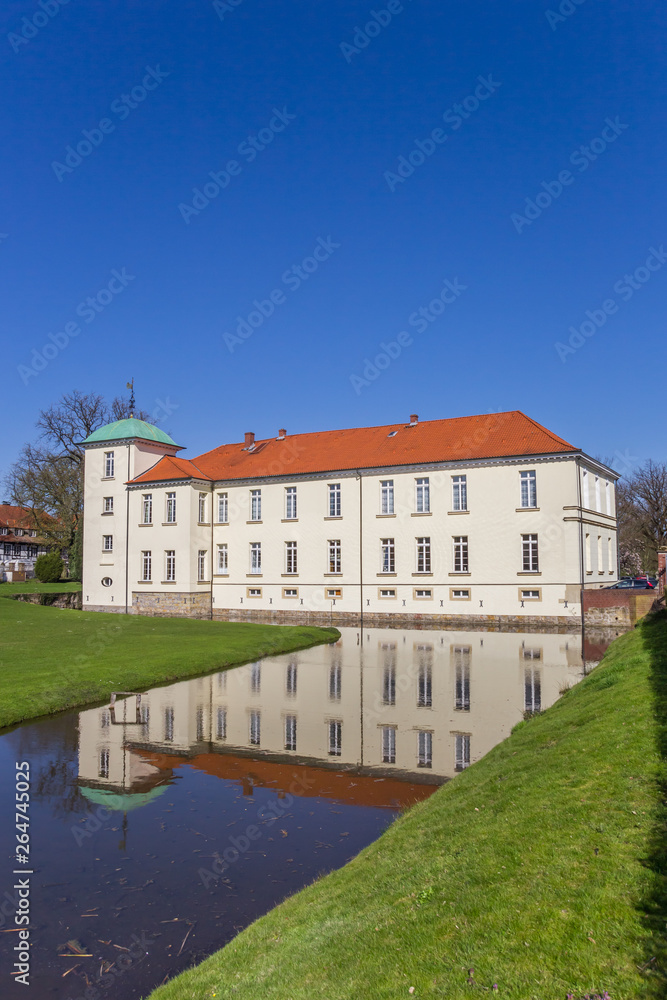 Castle Westerholt with reflection in the water in Germany