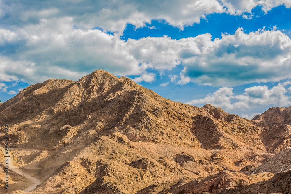 picturesque desert mountain dunes wilderness scenic landscape in USA Nevada state in north America, saturated yellow and blue colors, daily planet travel concept photography   