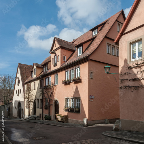 ROTHENBURG OB DER TAUBER, GERMANY - MARCH 05, 2018: Historic colorful half-timbered houses in the medieval town Rothenburg ob der Tauber, one of the most beautiful villages in Europe, Germany