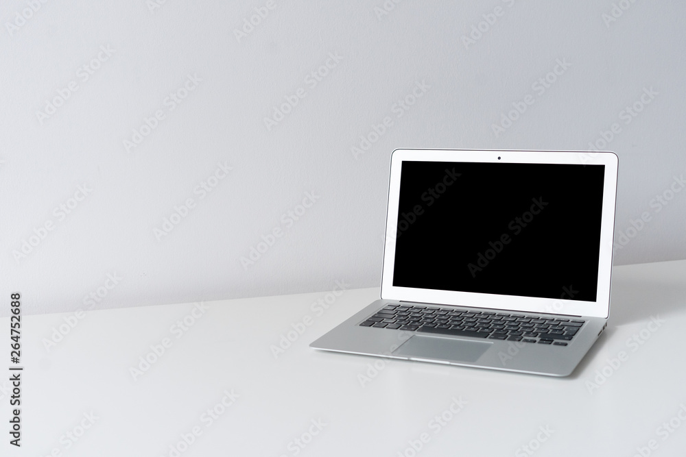 Open laptop on the desk with white background Open laptop on the desk with white background