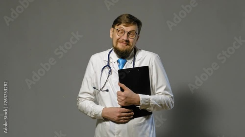 doctor man in white coat on gray background, medicine concept