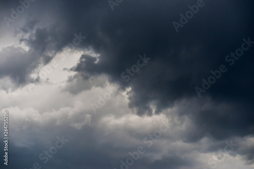 Fast moving dark dramatic storm clouds at springtime in the Carpathian mountains.
