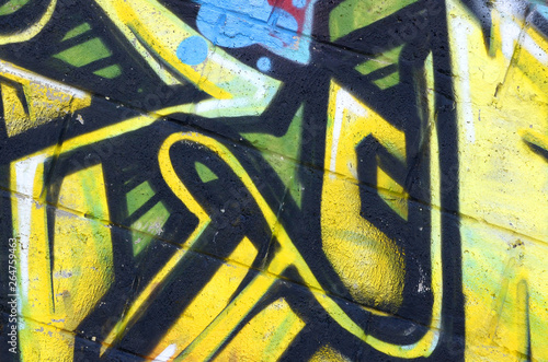 Fragment of colored street art graffiti paintings with contours and shading close up photo