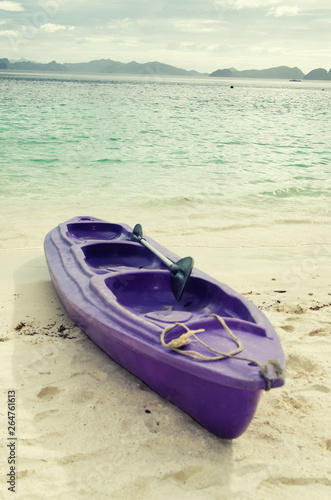 Active holiday at the sea. Old kayak. © vladorlov