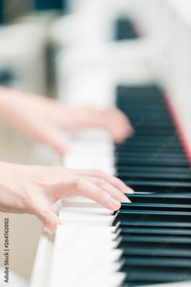 Fototapeta premium Playing piano