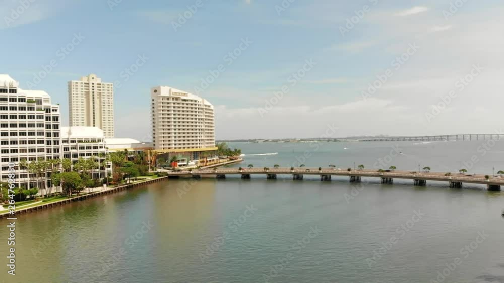 Business buildings at Downtown Miami, Brickell Key and Brickell Key Drive bridge Aerial view of Drawbridge on Miami River surrounded by business buildings at Downtown Miami Business buildings at Downtown Miami, Brickell Key and Brickell Key Drive bridge Aerial view of Drawbridge on Miami River surrounded by business buildings at Downtown Miami