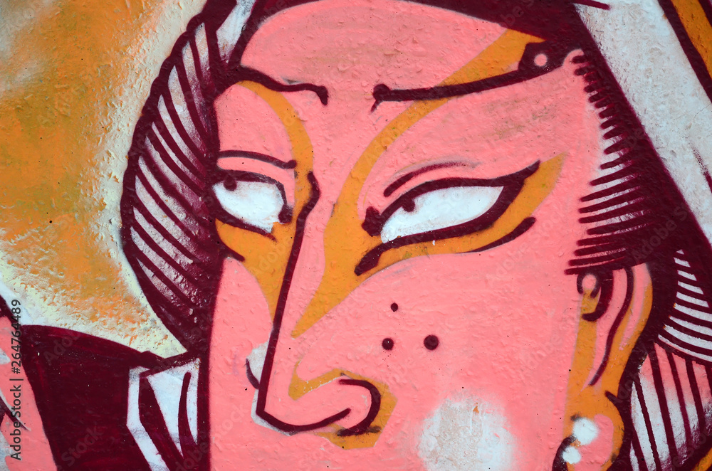 Fototapeta premium Fragment of colored street art graffiti paintings with contours and shading close up