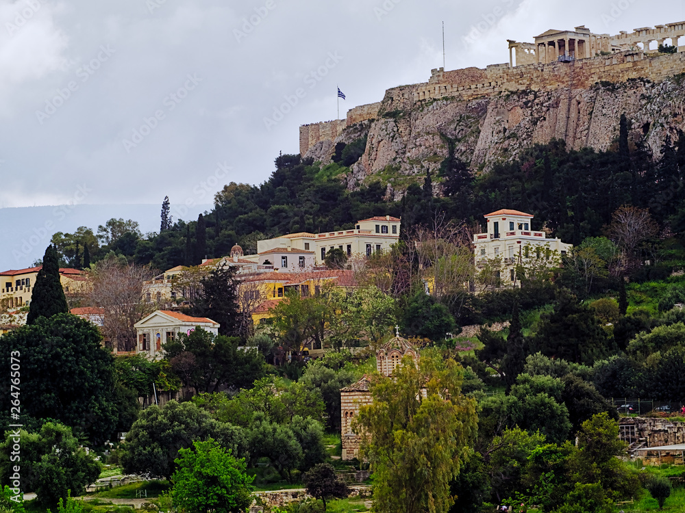Acropolis in Athens Greece and houses on the hill. View from ancient (arhaia) Agora.