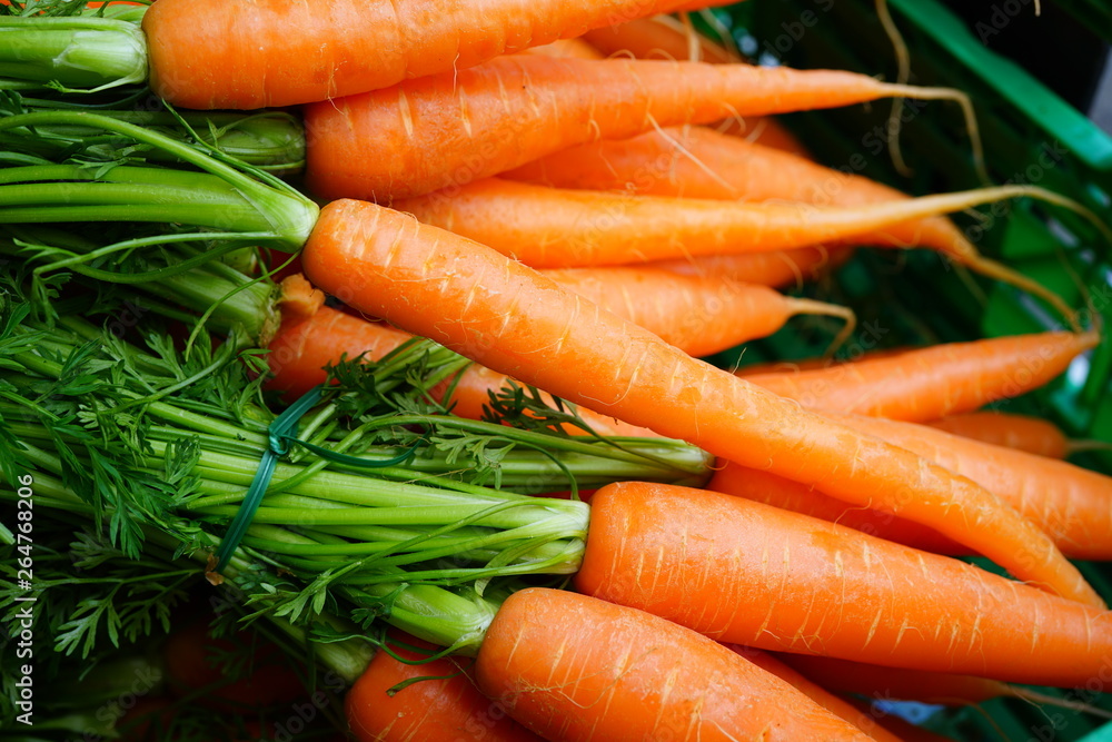 Fresh carrots for sale at a farmers market Fresh carrots for sale at a farmers market