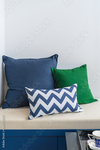 comfrotable bench with set of pillows photo