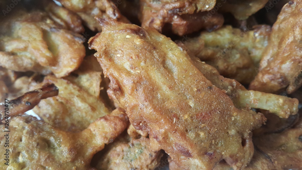 Crispy Corn Tikki, pakora/pakoda or patties are popular indian or pakistani street food snack Crispy Corn Tikki, pakora/pakoda or patties are popular indian or pakistani street food snack