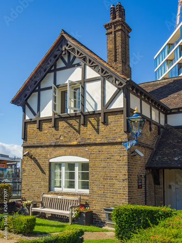 Wharfinger Cottage by the Tower of London which was once used as the home of the Controller of the Tower Wharf, known as the Wharfinger.  photo