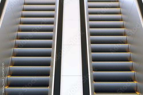 Metal escalator in modern office or public building, shopping mall, airport, railway or metro subway station