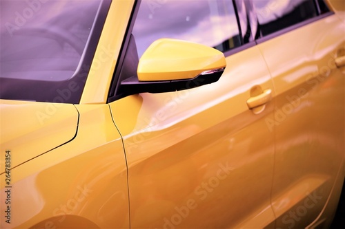 yellow car on the street
