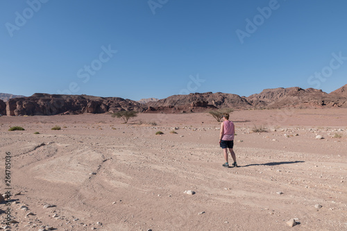 woman walking in tima national park in