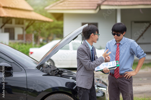 Insurance agents check for damaged cars for car insurance customer. Car insurance.
