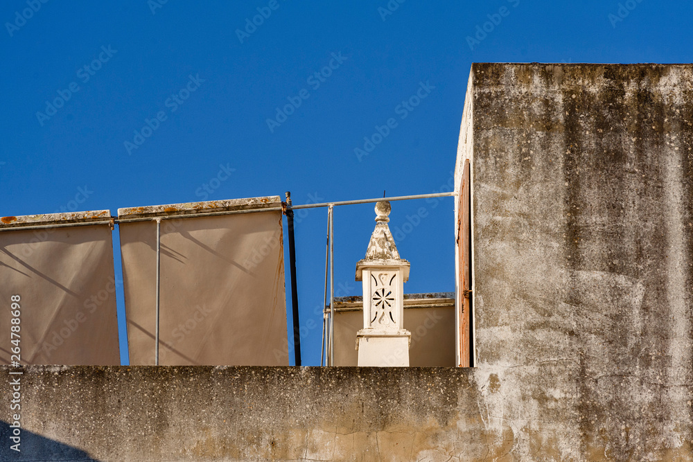 Fototapeta premium TAVIRA, ALGARVE, PORTUGAL - Algarvian chimneys 