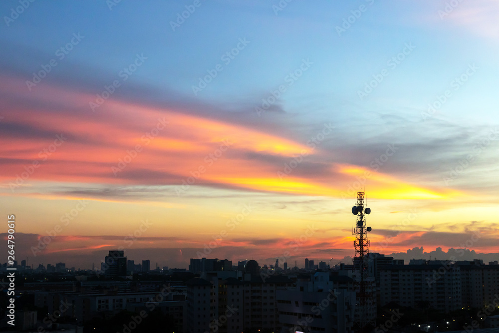 Dramatic twilight sky with city on background. Dramatic twilight sky with city on background.