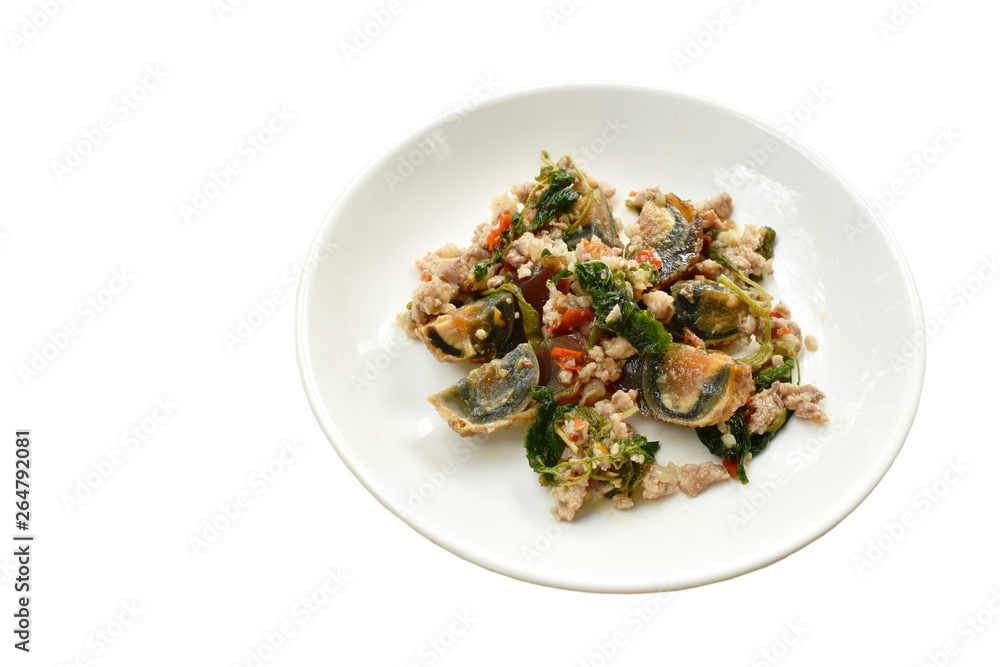 stir fried crispy basil leaf with black preserved egg and minced pork on dish stir fried crispy basil leaf with black preserved egg and minced pork on dish