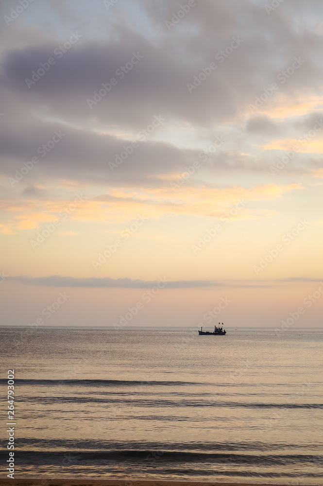 Boat and Beach in sunset