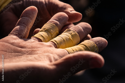 Taping fingers for climbing