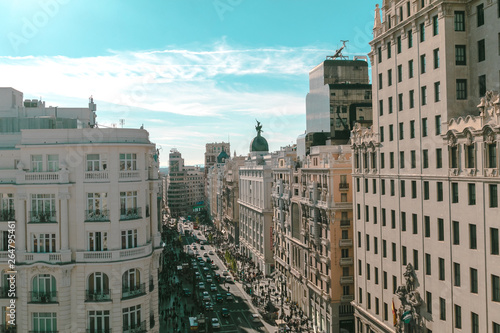 Panorama top view of Gran Via, main shopping street in Madrid from roof top bar, capital of Spain, Europe.  photo