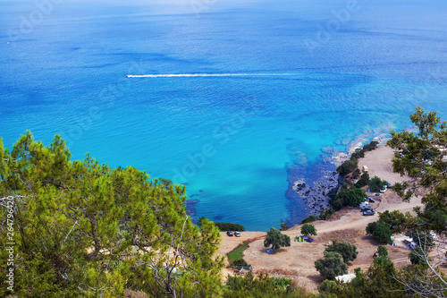 Fototapeta Naklejka Na Ścianę i Meble -  Small speed  boat and wild  beach on Cyprus island. Azure