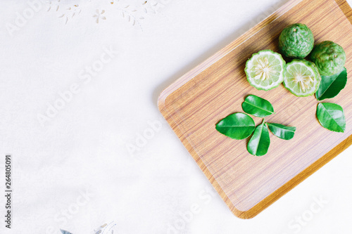 Kaffir lime on wooden background