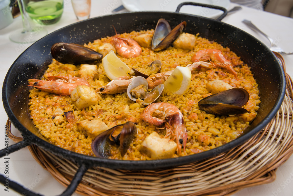 Paella with fish and seafood Paella with fish and seafood