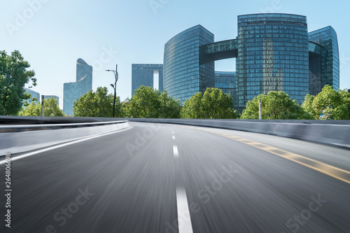 Empty road floor surface with modern city landmark buildings of hangzhou bund Skyline zhejiang china