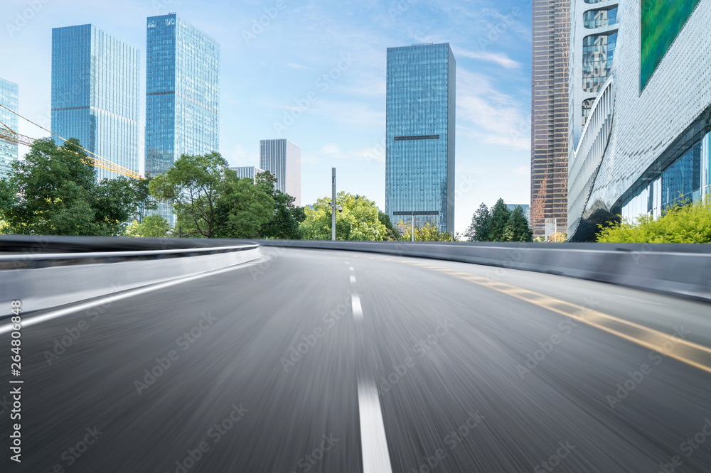 Obraz premium Empty road floor surface with modern city landmark buildings of hangzhou bund Skyline,zhejiang,china