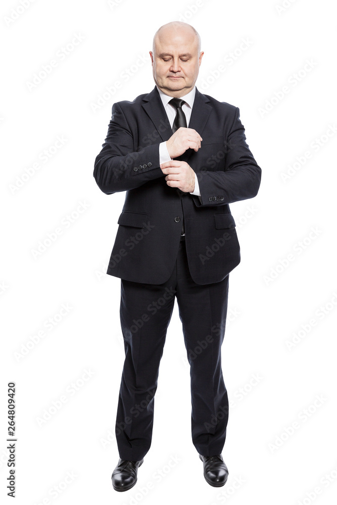Bald middle-aged man in a suit in full growth. Vertical. Isolated on a white background. Bald middle-aged man in a suit in full growth. Vertical. Isolated on a white background.
