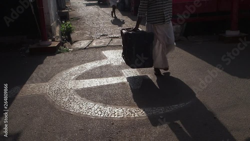 The hammer and sickle logo for the democratically elected state government of Kerala, in the city of Thalassery, Kerala, India