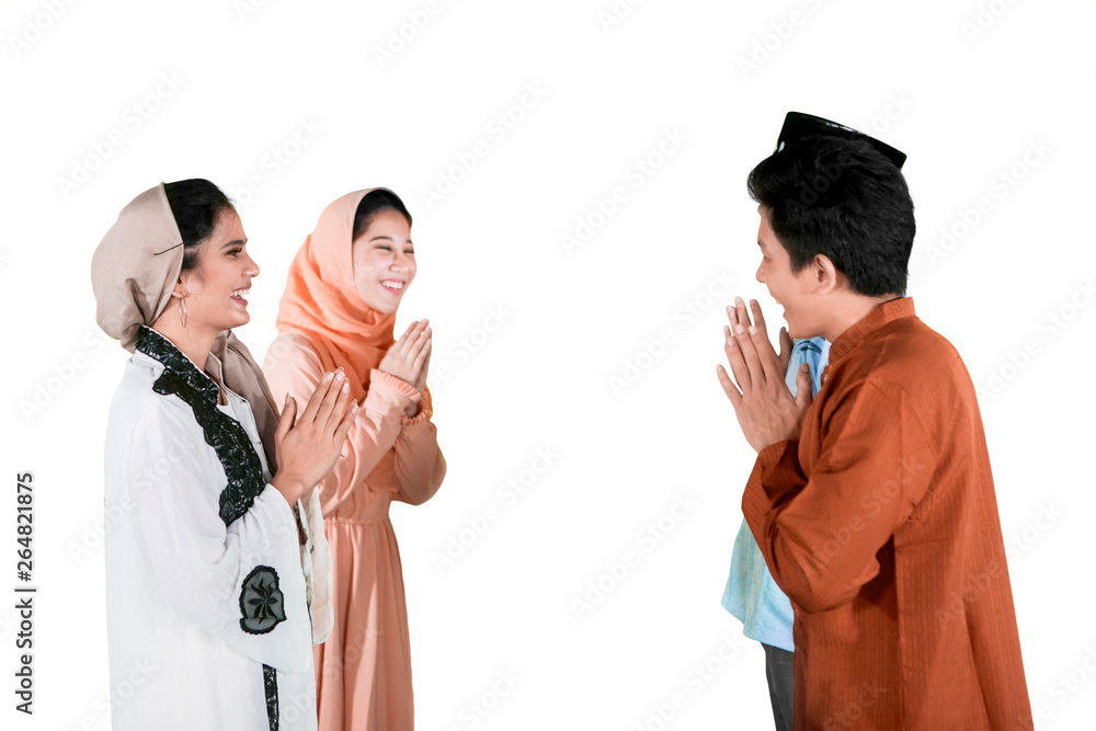 Muslim people give greet hands to forgive on studio Muslim people give greet hands to forgive on studio