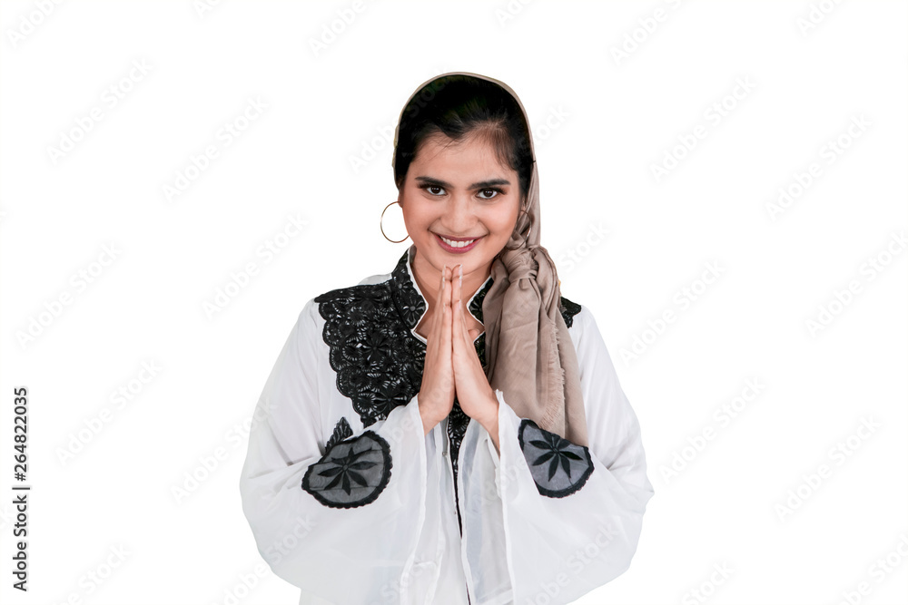 Muslim woman congratulates Eid Mubarak on studio Muslim woman congratulates Eid Mubarak on studio