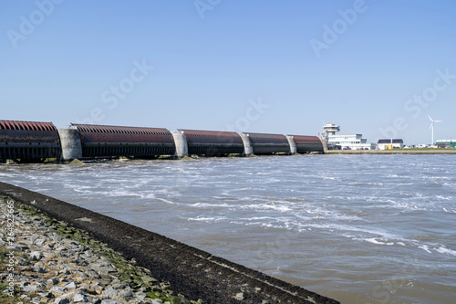 Eidersperrwerk (Eider Barrage) at the mouth of the river Eider near Tönning on Germany’s North Sea coast. It is Germany’s largest coastal protection structure. photo