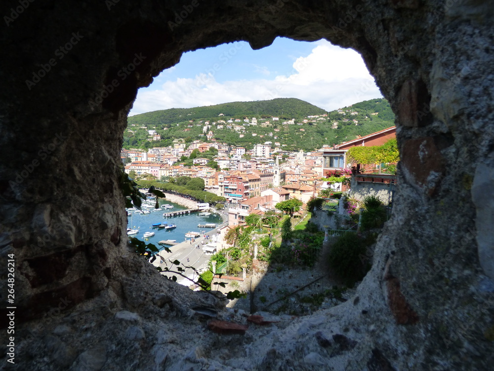 Lerici Harbor viewed through  canon port of the castle