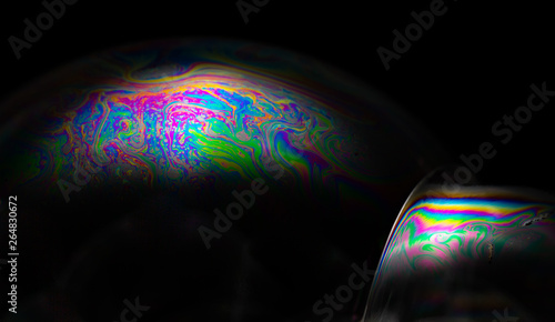 Light refraction in two joined soap bubbles